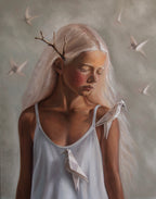 Alexis by Kareen Kalush, a portrait of a young woman with closed eyes, long platinum-blonde hair, a branch behind her ear, and white origami birds against a soft gray background.
