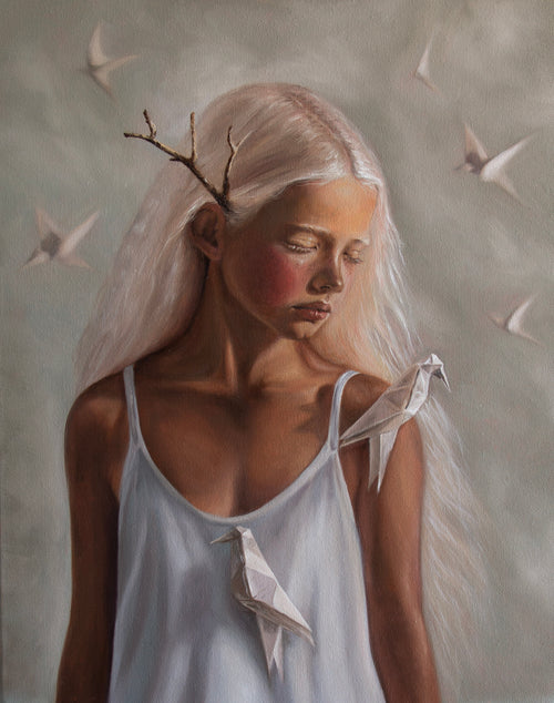 Alexis by Kareen Kalush, a portrait of a young woman with closed eyes, long platinum-blonde hair, a branch behind her ear, and white origami birds against a soft gray background.
