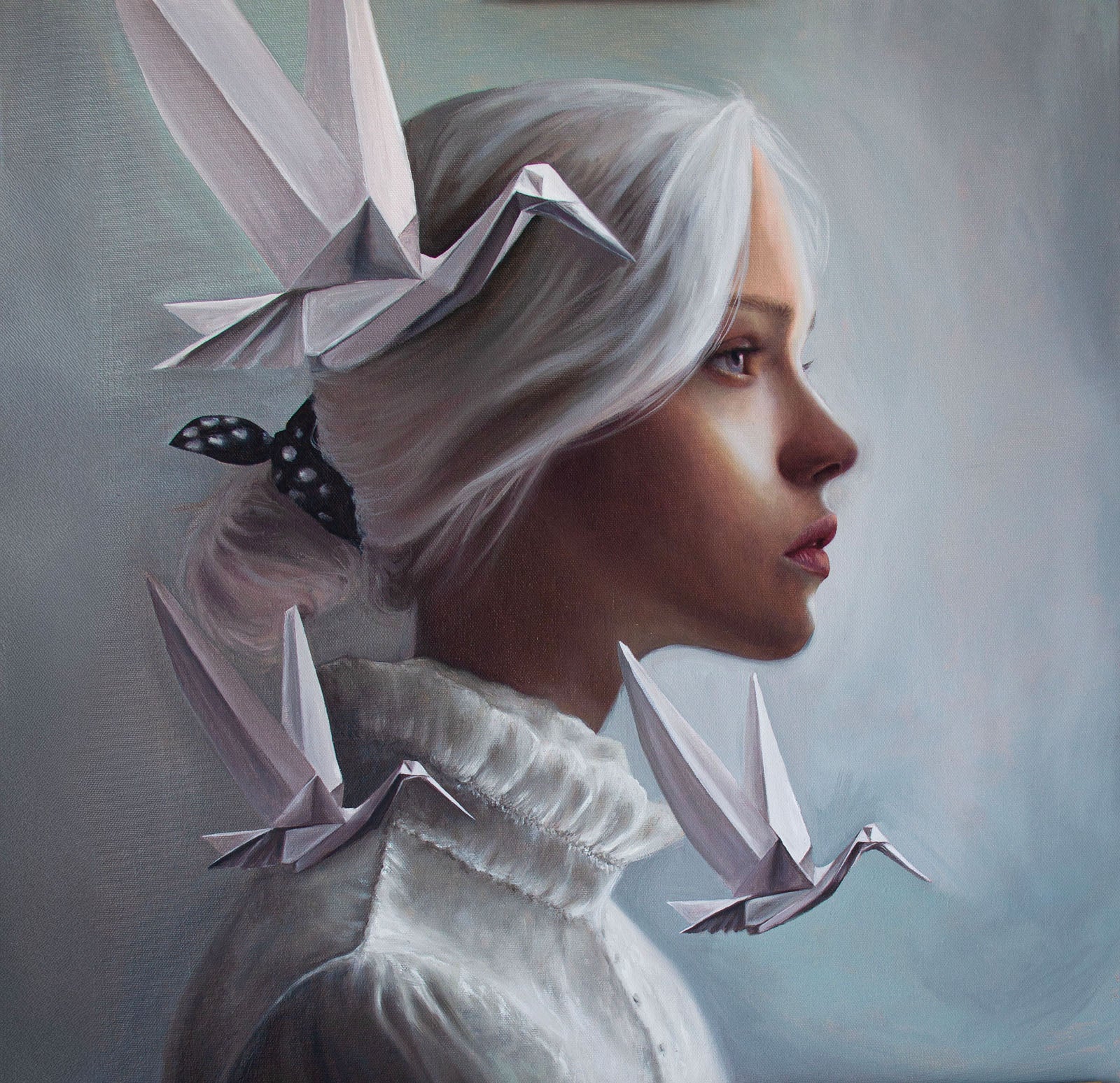 The Chaos I left behind, an original oil painting by Kareen Kalush showing a painted portrait of a young woman in profile with pale silver-white hair, wearing a white ruffled collar garment and several white origami cranes around her head and shoulders against a soft gray-blue background.